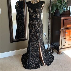 Black lace gown with pink underlayer